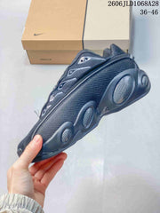 Nike NOCTA Glide Black/White Low-Top Sneakers