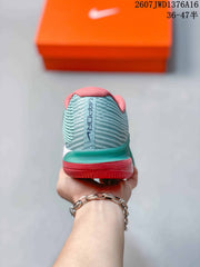 Nike Vapor 12 Low-Top Tennis Sneakers in Mint Green and Coral
