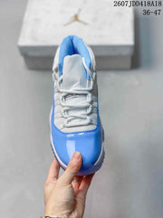 Jordan Air Jordan 11 Retro High-Top Sneakers Blue and White