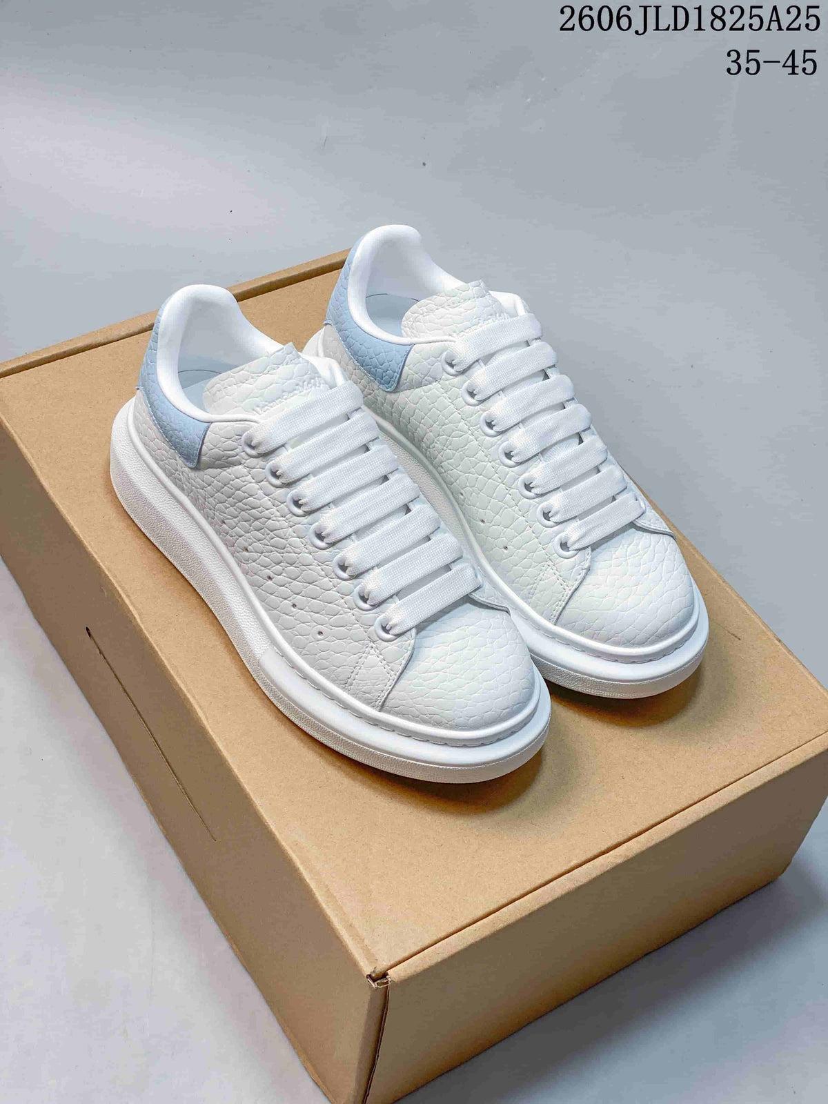 Alexander McQueen White Platform Sneakers with Blue Heel Tab