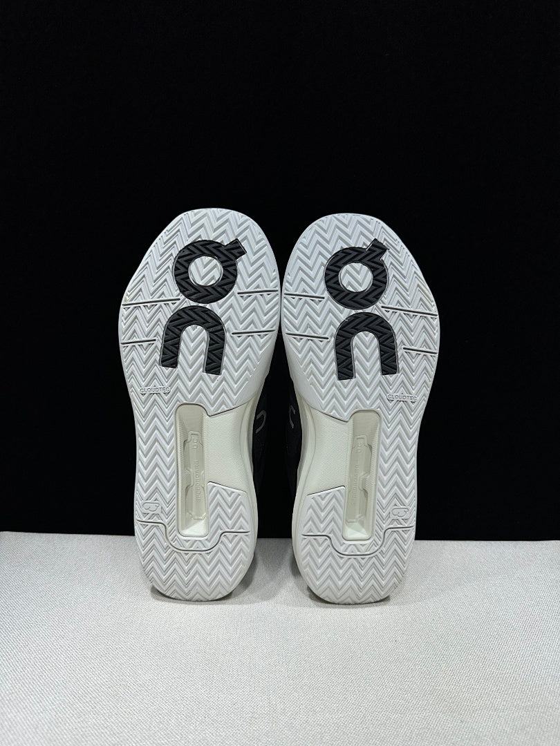 On THE ROGER Clubhouse Pro Tennis Sneakers Black and White