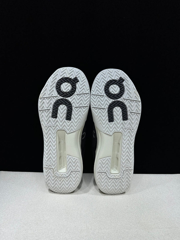 On THE ROGER Clubhouse Pro Tennis Sneakers Black and White
