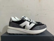 New Balance U370 Sneakers in Black, Gray and White