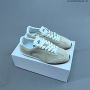 Alo Yoga Sunset Sneaker in Black and Ivory