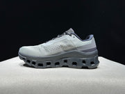 On Cloudmonster Running Shoes in Eclipse and Magnet