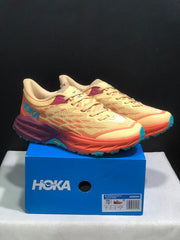 HOKA Speedgoat 5 Trail Running Shoes in Yellow and Coral