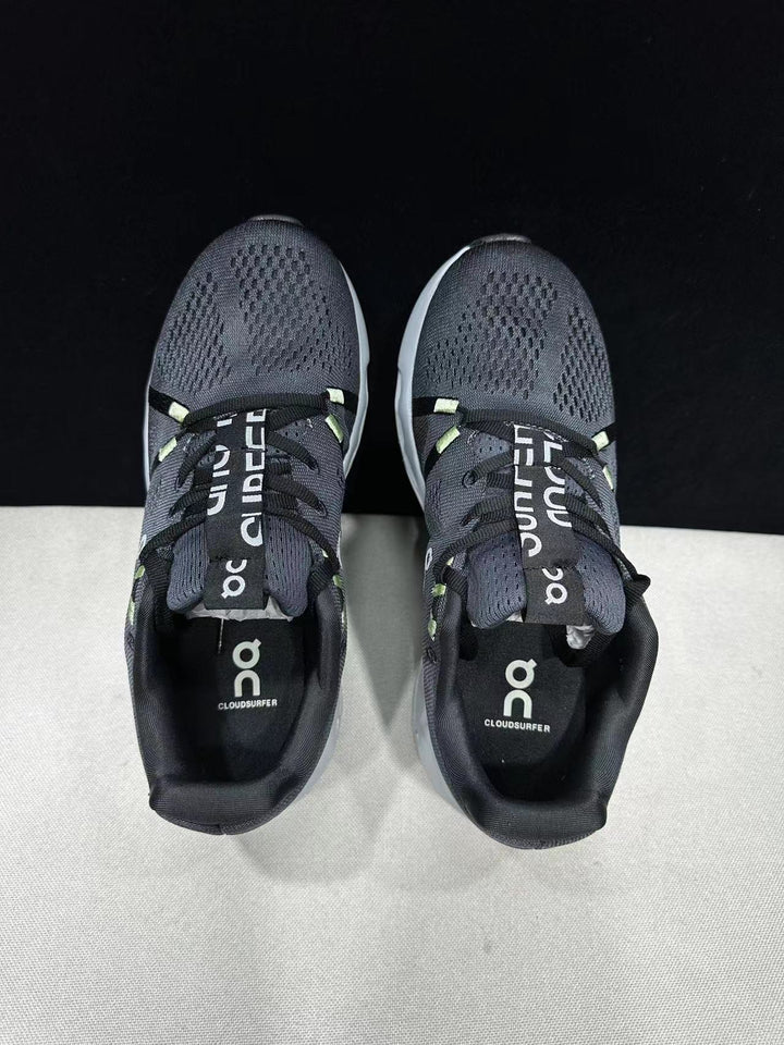 On Cloudsurfer Running Shoes in Black and Glacier