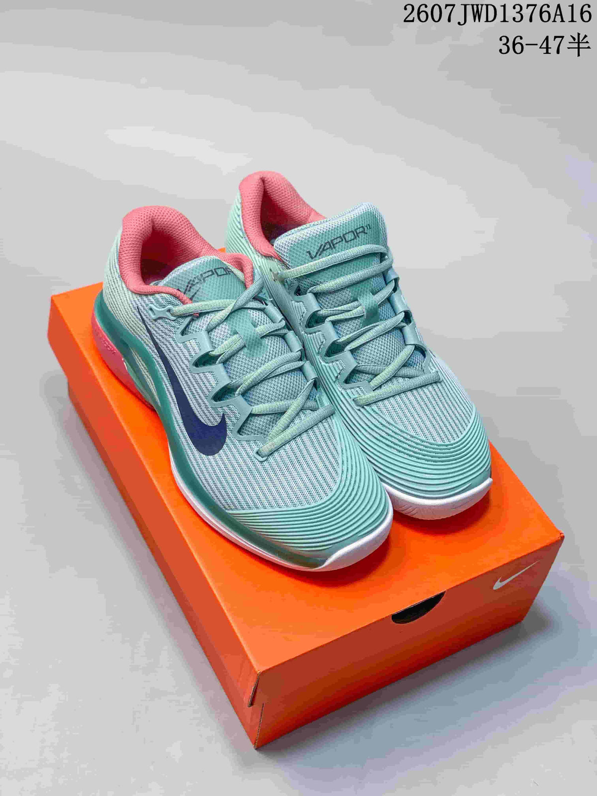 Nike Vapor 12 Low-Top Tennis Sneakers in Mint Green and Coral