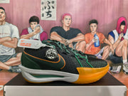 Nike Black and Green Basketball Shoes with Orange Accents