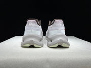 On Cloudtilt Sneakers in Blush Pink and Pearl White