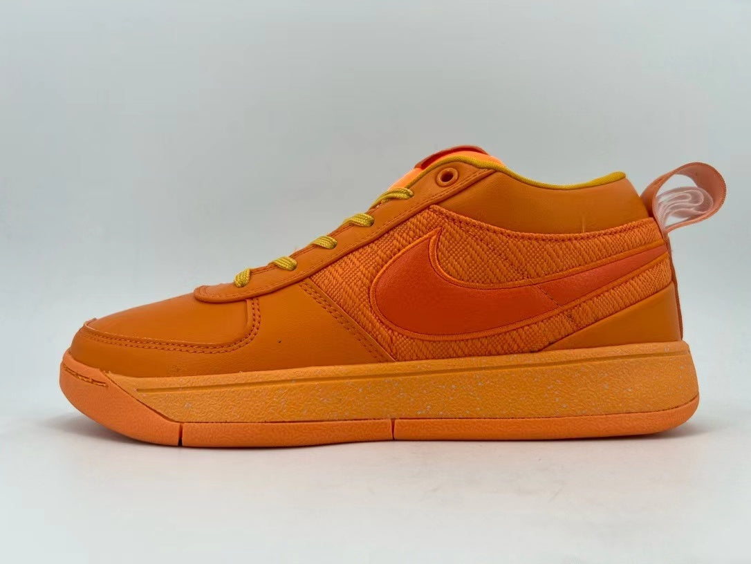 Nike Orange Low-Top Sneakers