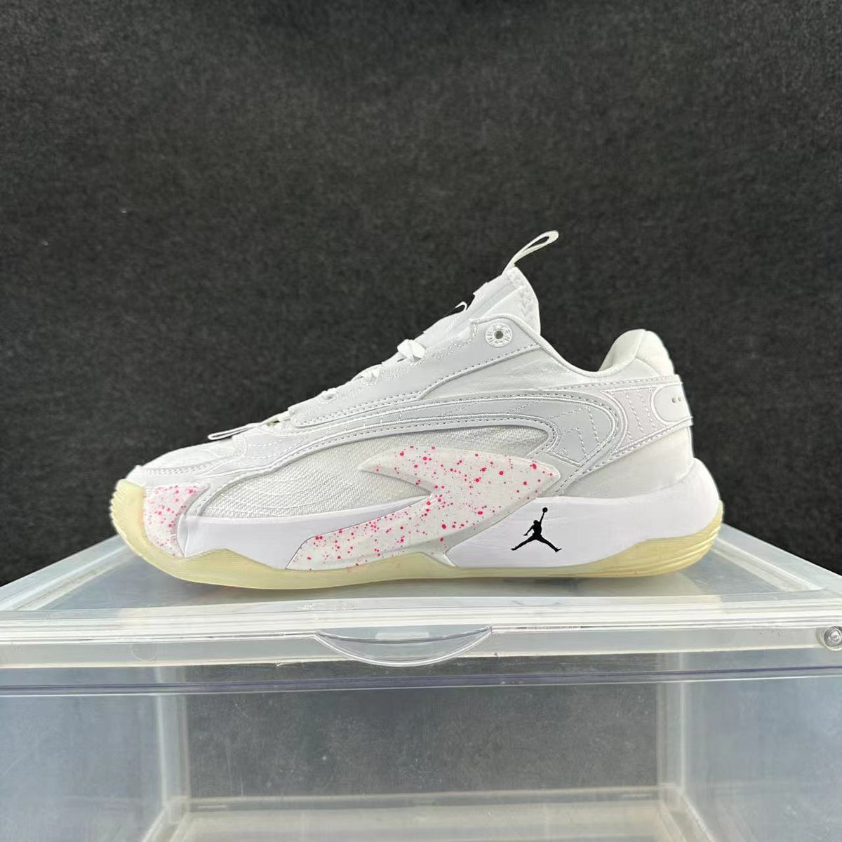 Jordan White and Pink Low-Top Sneakers