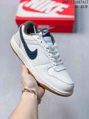 Nike Big Nike Low Sneakers in Black, Green, White and Navy