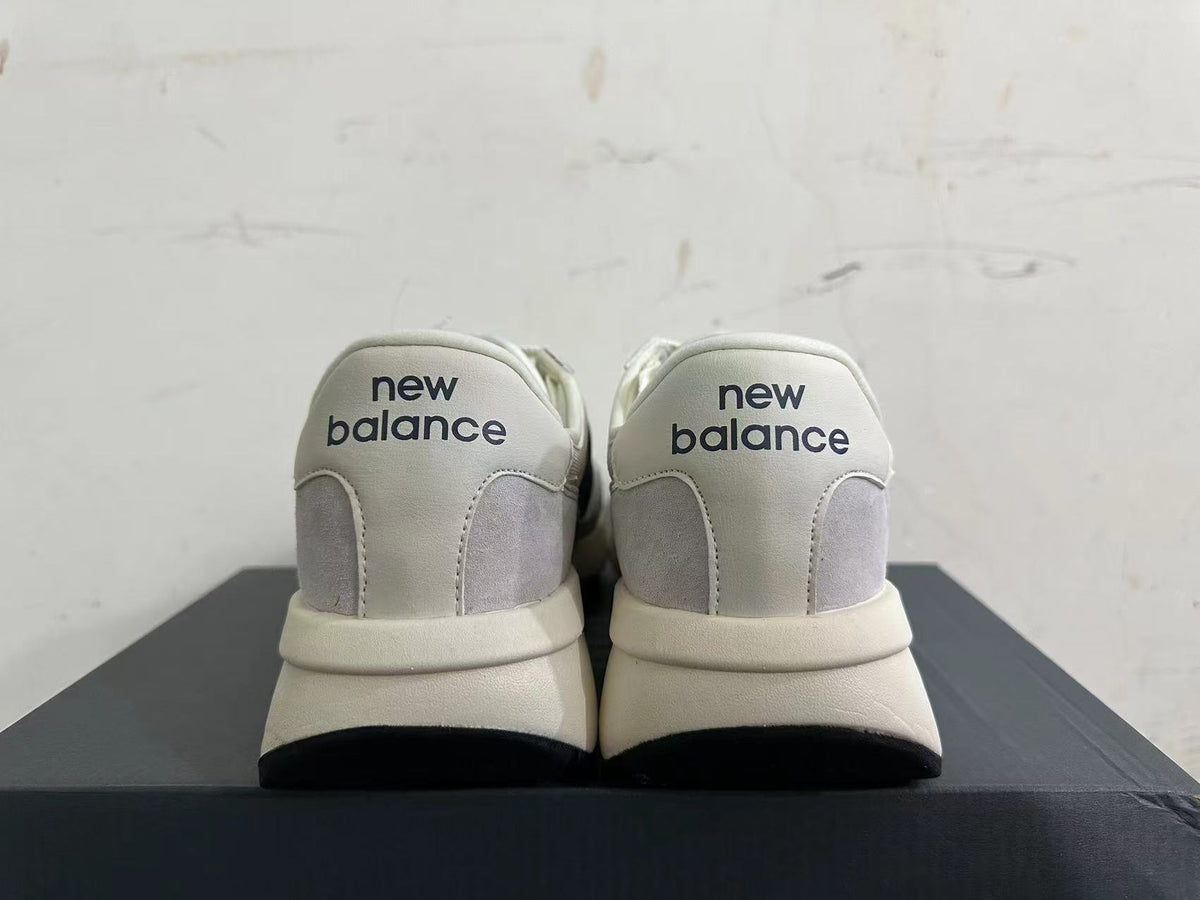New Balance U370 Sneakers in Gray and Navy