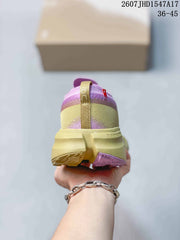 On CloudSoma Sneakers in Pink and Yellow
