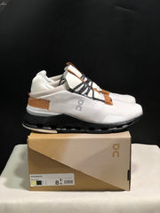 On Cloudnova Sneakers in White, Black and Tan