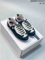 Chanel Black and White Low-Top Trainer