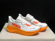 HOKA Clifton 10 Running Shoes in White and Orange